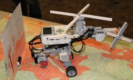 These middle school students from Olympia are using their award-winning First Lego League model helicopter to make wildland firefighting safer. Photo by Janet Pearce